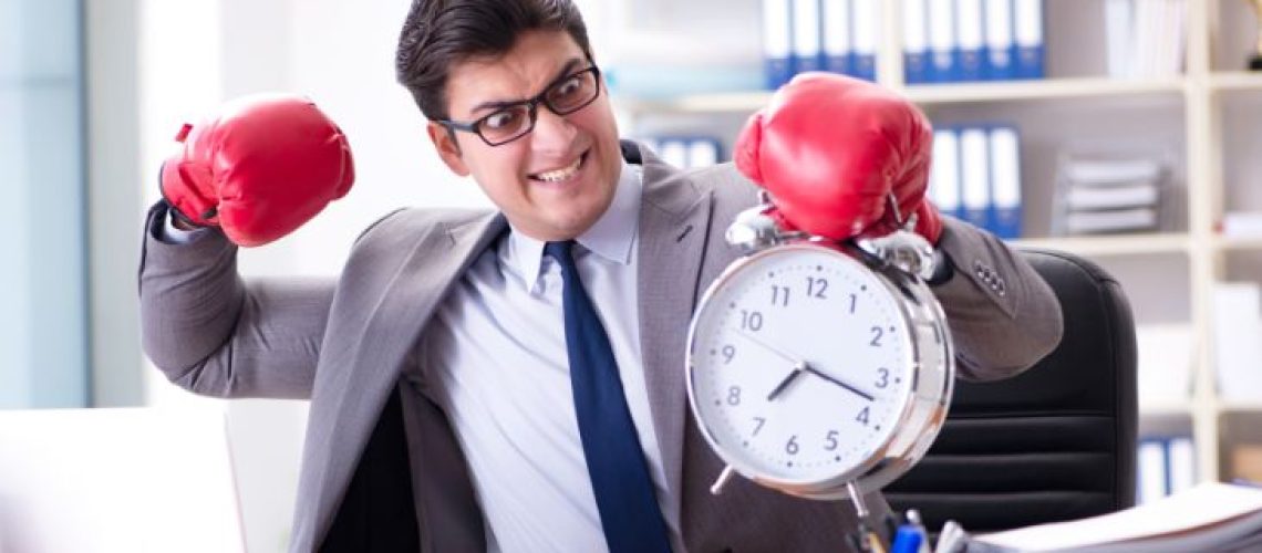 Frustrated man with clock